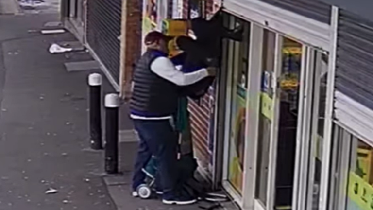 A shopkeeper rushes out to help Ms Hughes. Pic: Kennedy News and Media