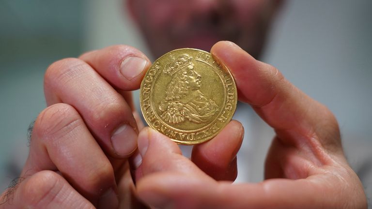 A golden coin that once belonged to the collection of Danish king Frederik VII. Pic: AP