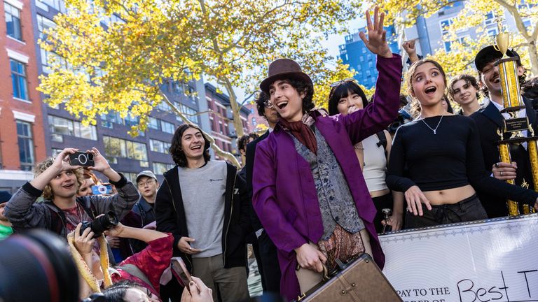 Miles Mitchell, 21, winner of the Timothee Chalamet lookalike contest near Washington Square Park, Sunday, Oct. 27, 2024, in New York. (AP Photo/Stefan Jeremiah)